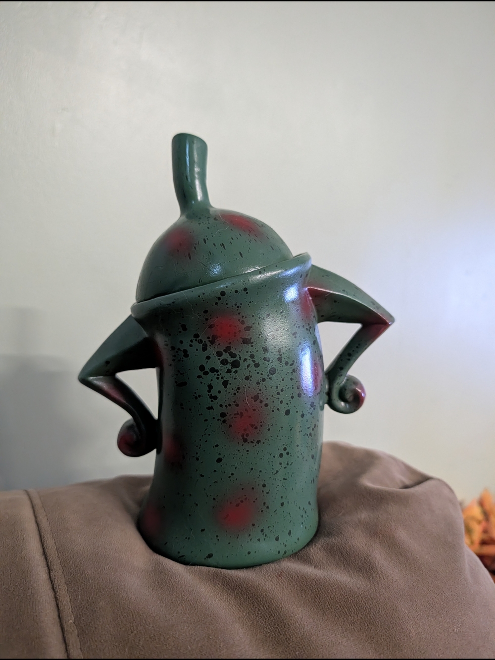 Amazon Green Plastic Figurine with Red Speckles